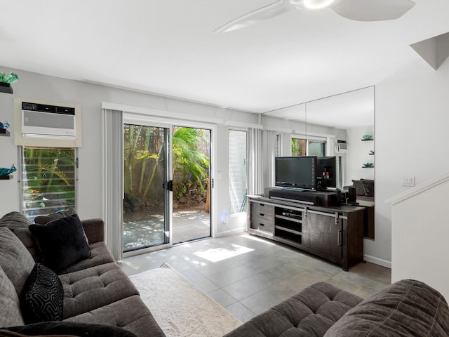 68 Walaka St Unit 5, Kihei, HI 96753 - living area with light tile patterned floors, a ceiling fan, and a wall mounted air conditioner