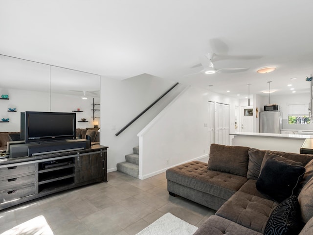 68 Walaka St Unit 5, Kihei, HI 96753 - living room with a ceiling fan, stairway, and light tile patterned flooring