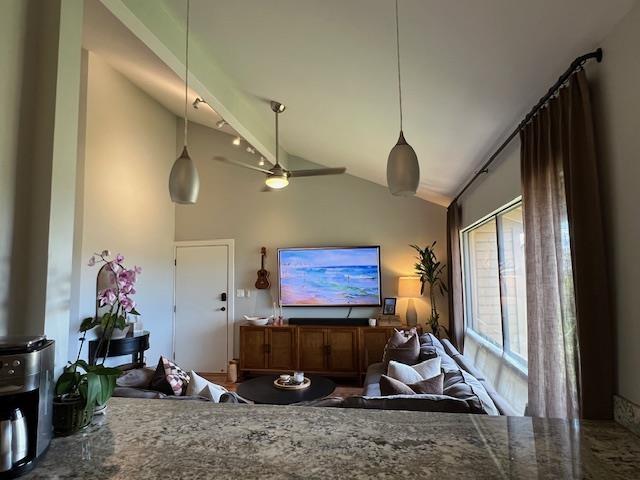15 Kulanihakoi St Unit 9E, Kihei, HI 96753 - living area featuring lofted ceiling and ceiling fan