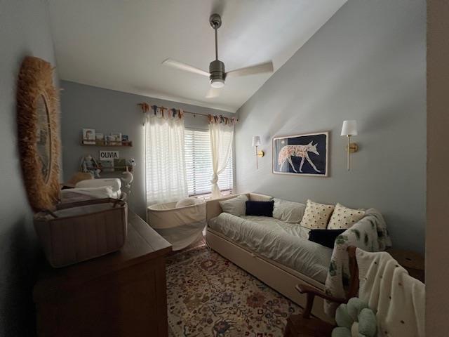 15 Kulanihakoi St Unit 9E, Kihei, HI 96753 - bedroom featuring a ceiling fan and vaulted ceiling