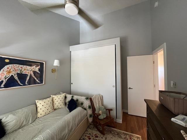 15 Kulanihakoi St Unit 9E, Kihei, HI 96753 - living area with a ceiling fan and wood finished floors