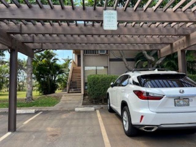 15 Kulanihakoi St Unit 9E, Kihei, HI 96753 - covered parking lot with stairs