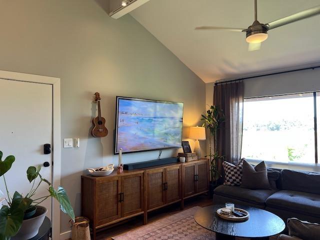 15 Kulanihakoi St Unit 9E, Kihei, HI 96753 - living room with a ceiling fan, wood finished floors, and high vaulted ceiling