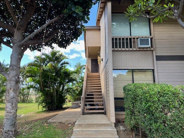 15 Kulanihakoi St Unit 9E, Kihei, HI 96753 - view of property featuring stairs