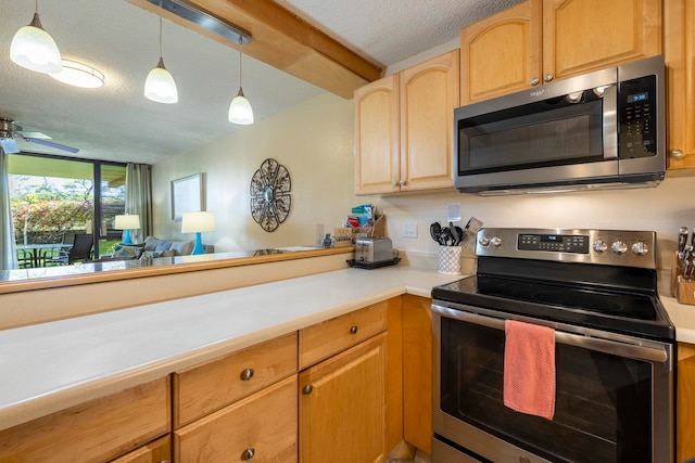 kitchen featuring ceiling fan, stainless steel appliances, decorative light fixtures, a textured ceiling, and light brown cabinetry