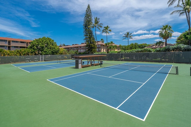 view of tennis court with basketball court