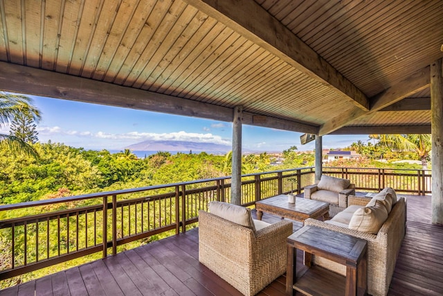 wooden deck with an outdoor hangout area