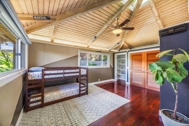 bedroom with dark hardwood / wood-style floors, lofted ceiling with beams, and wooden ceiling