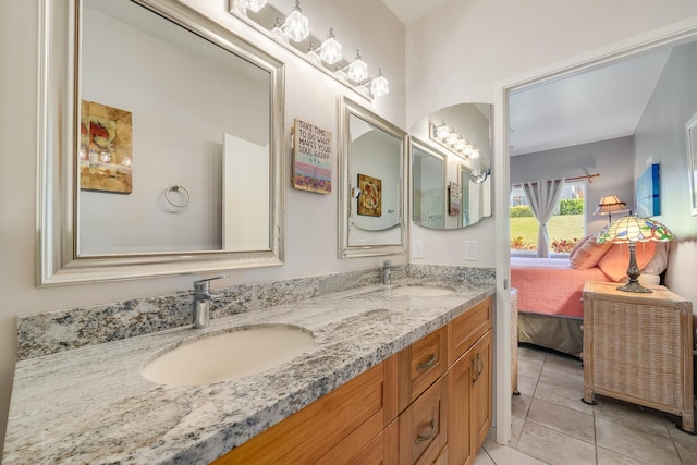 bathroom featuring tile patterned floors and vanity