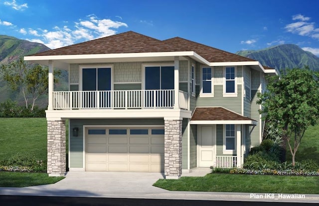 view of front of property with a mountain view, a balcony, a garage, and a front yard