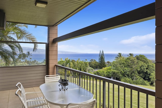 balcony featuring a water view