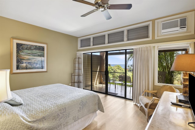 bedroom featuring light wood-type flooring, ceiling fan, access to outside, and multiple windows