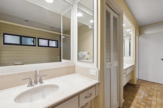 bathroom with vanity and tile patterned floors