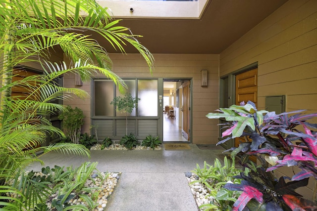 doorway to property with a patio