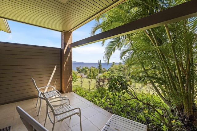 view of patio / terrace with a water view