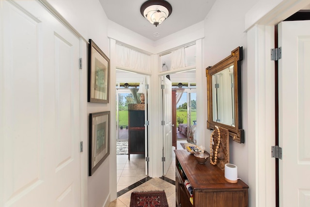 entryway featuring light tile patterned flooring