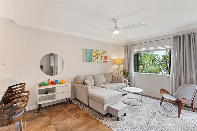 tiled living room featuring ceiling fan and crown molding