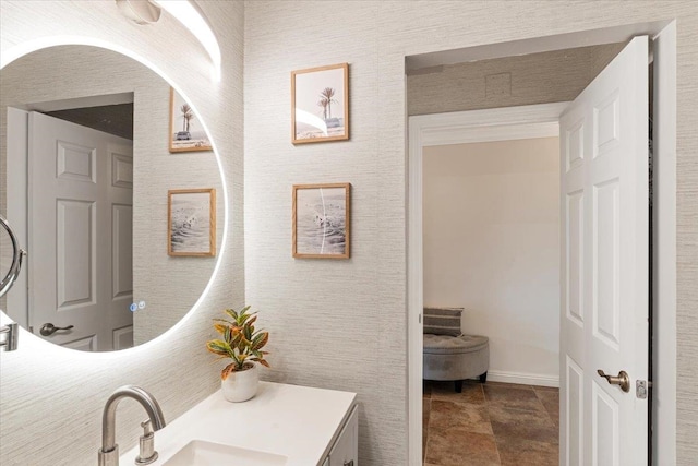 bathroom with vanity, tile floors, and toilet