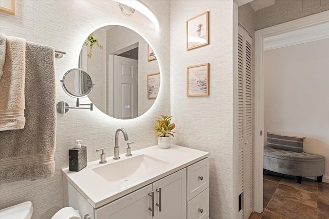 bathroom with tile floors and vanity