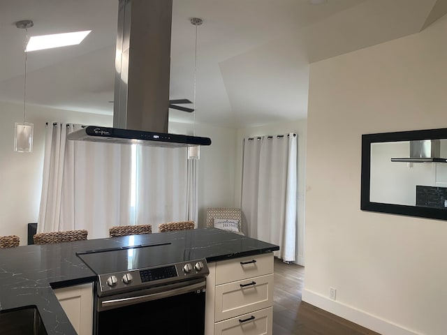 kitchen featuring white cabinetry, dark stone countertops, dark wood-type flooring, island exhaust hood, and electric range