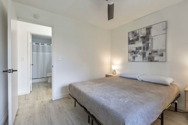 480 Kenolio Rd Unit 24-202, Kihei, HI 96753 - bedroom featuring light wood-type flooring, baseboards, and ceiling fan