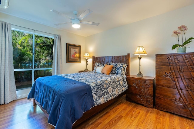 bedroom featuring hardwood / wood-style flooring and ceiling fan