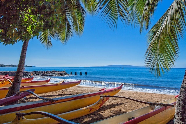 property view of water featuring a beach view