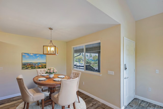 10 Polohina Ln Unit 2-3, Lahaina, HI 96761 - dining space with a chandelier, wood finished floors, and baseboards
