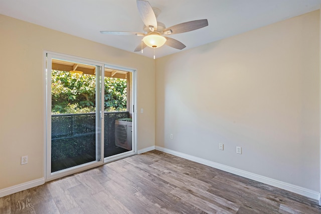 10 Polohina Ln Unit 2-3, Lahaina, HI 96761 - empty room with wood finished floors, baseboards, and ceiling fan
