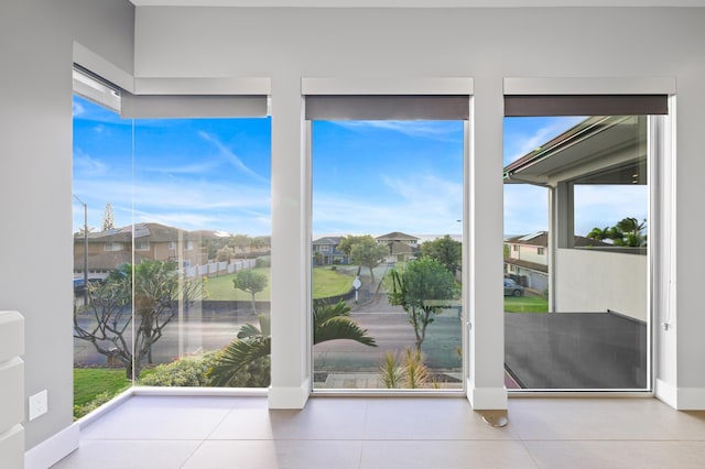 92 Kahana Ridge Dr, Lahaina, HI 96761 - entryway featuring a residential view, baseboards, and tile patterned flooring