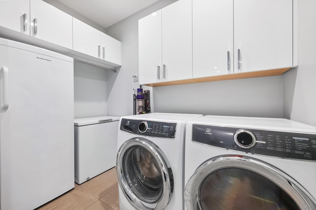 92 Kahana Ridge Dr, Lahaina, HI 96761 - laundry area with separate washer and dryer, cabinet space, and light tile patterned floors