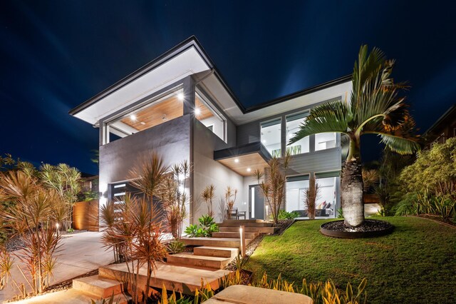 92 Kahana Ridge Dr, Lahaina, HI 96761 - back of house at twilight with stucco siding