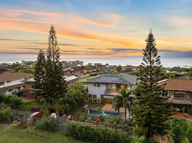 92 Kahana Ridge Dr, Lahaina, HI 96761 - aerial view at dusk of a water view, view of pool area, and a residential view