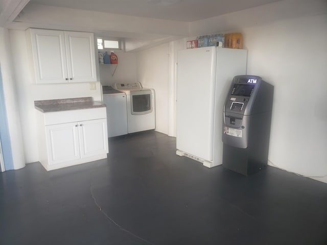 215 Aahi Pl, Kaunakakai, HI 96748 - washroom featuring washer and clothes dryer and cabinet space