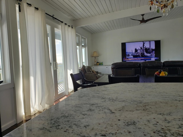 215 Aahi Pl, Kaunakakai, HI 96748 - dining room featuring beamed ceiling and wooden ceiling