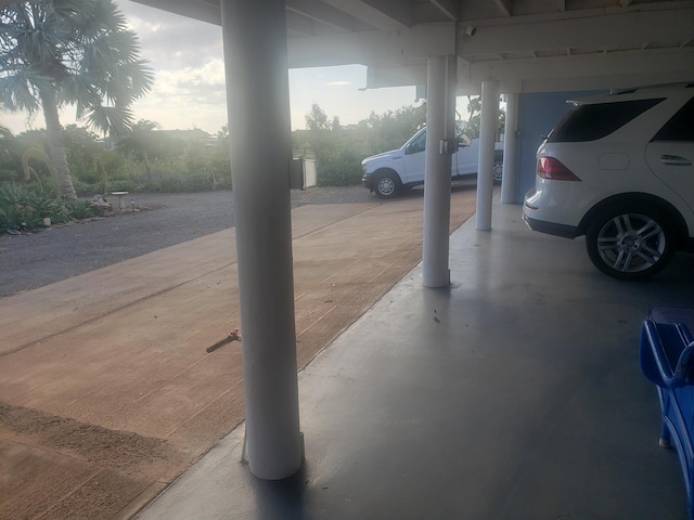 215 Aahi Pl, Kaunakakai, HI 96748 - garage featuring a carport