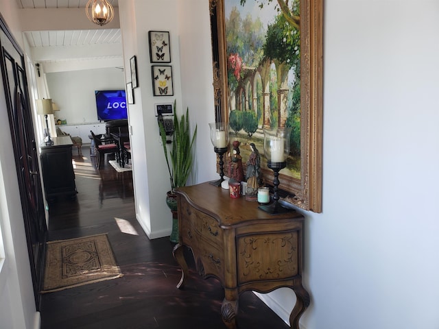 215 Aahi Pl, Kaunakakai, HI 96748 - hall with a desk, dark wood finished floors, baseboards, and beamed ceiling