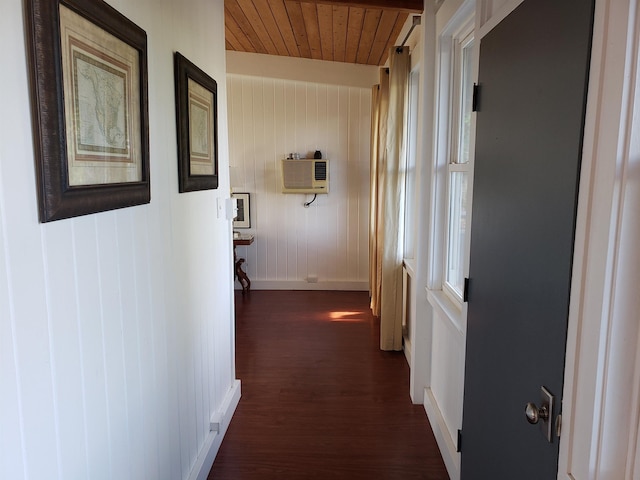 215 Aahi Pl, Kaunakakai, HI 96748 - hall with baseboards, dark wood-style flooring, wooden ceiling, and a wall unit AC