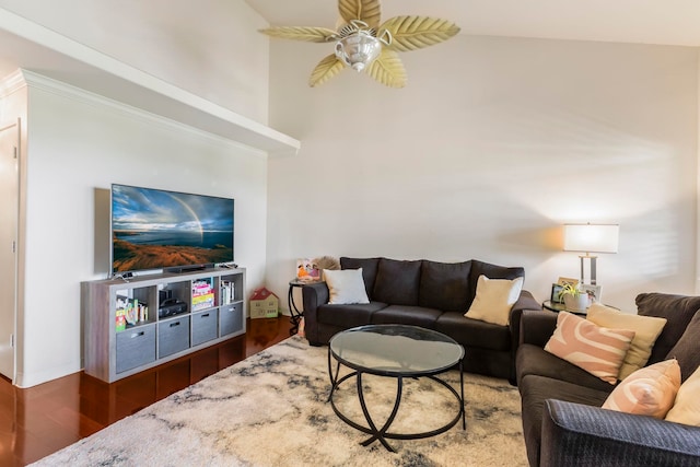 living room featuring ceiling fan, dark hardwood / wood-style flooring, and a towering ceiling