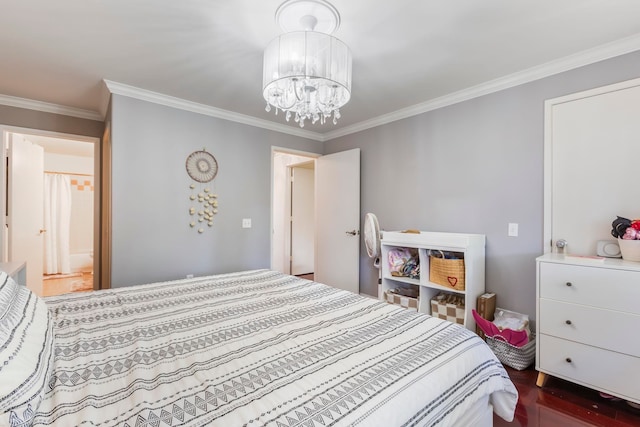 bedroom with dark wood-type flooring, ornamental molding, and a chandelier