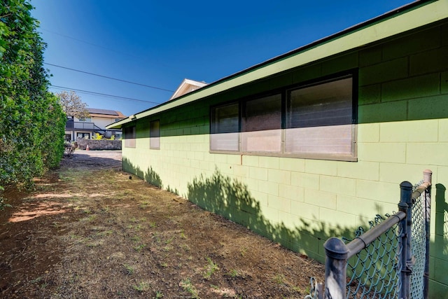 293 Manini Pl, Kihei, HI 96753 - view of side of property with concrete block siding