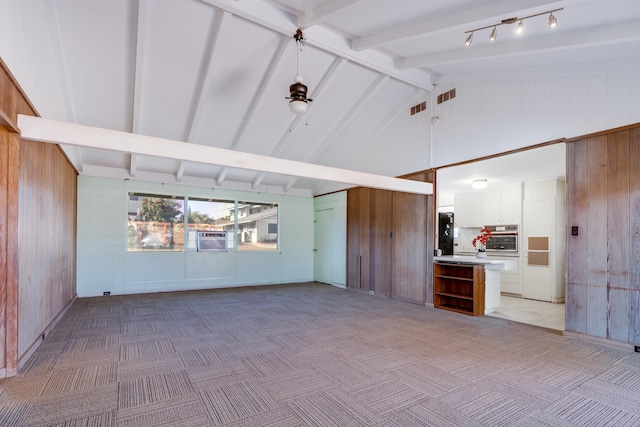 293 Manini Pl, Kihei, HI 96753 - interior space featuring wooden walls, visible vents, high vaulted ceiling, light carpet, and beamed ceiling