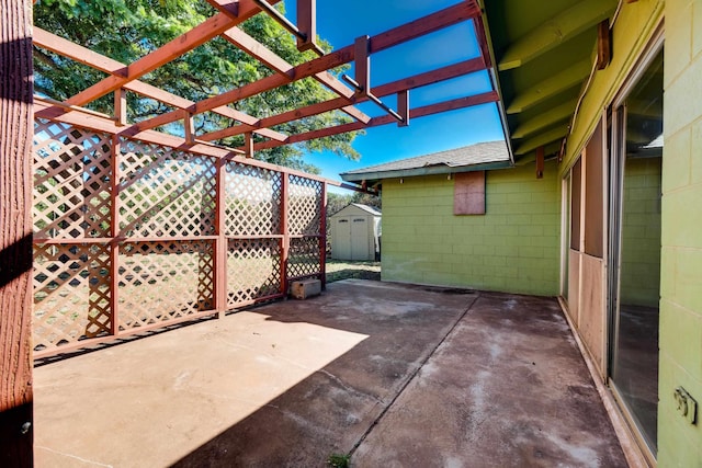 293 Manini Pl, Kihei, HI 96753 - view of patio featuring an outdoor structure and a shed
