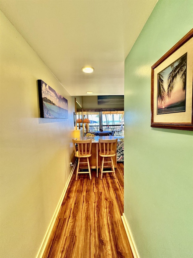 hall featuring hardwood / wood-style flooring