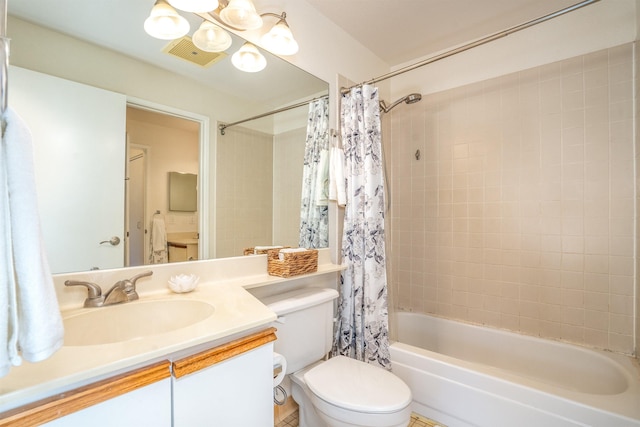 full bathroom with shower / tub combo with curtain, vanity, and toilet