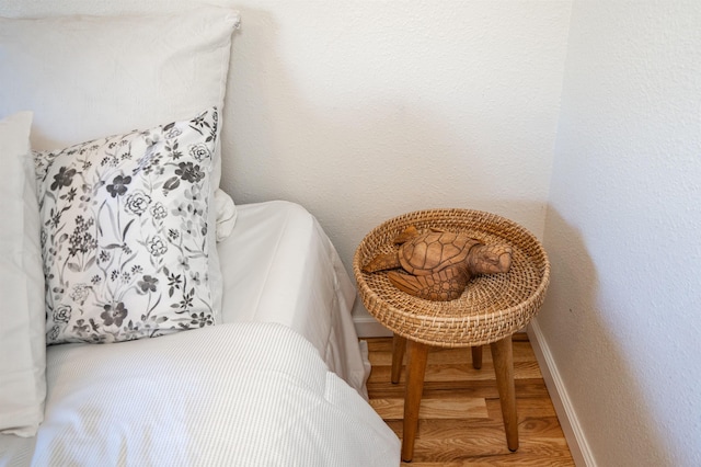 bedroom with hardwood / wood-style floors