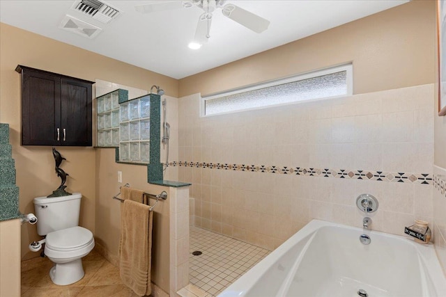 bathroom featuring toilet, tile patterned floors, ceiling fan, and separate shower and tub