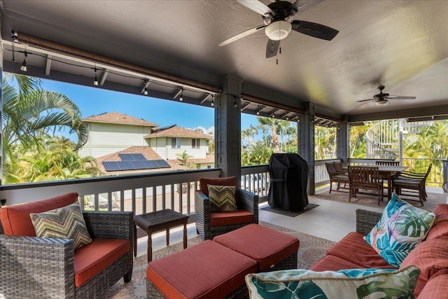 view of patio with ceiling fan, an outdoor hangout area, and area for grilling