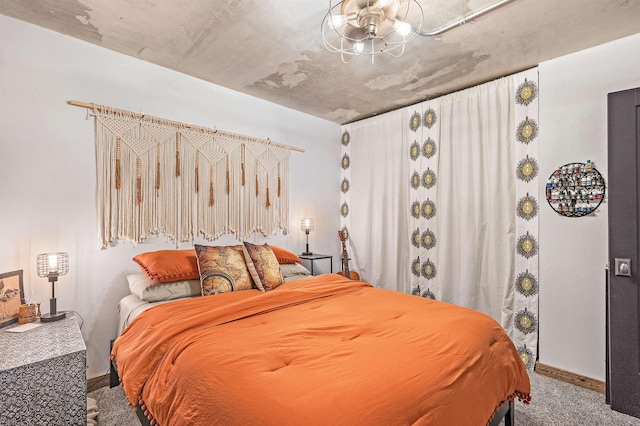 bedroom featuring carpet flooring and baseboards