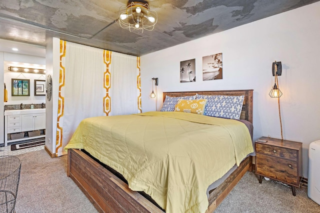 bedroom with carpet flooring and ensuite bathroom